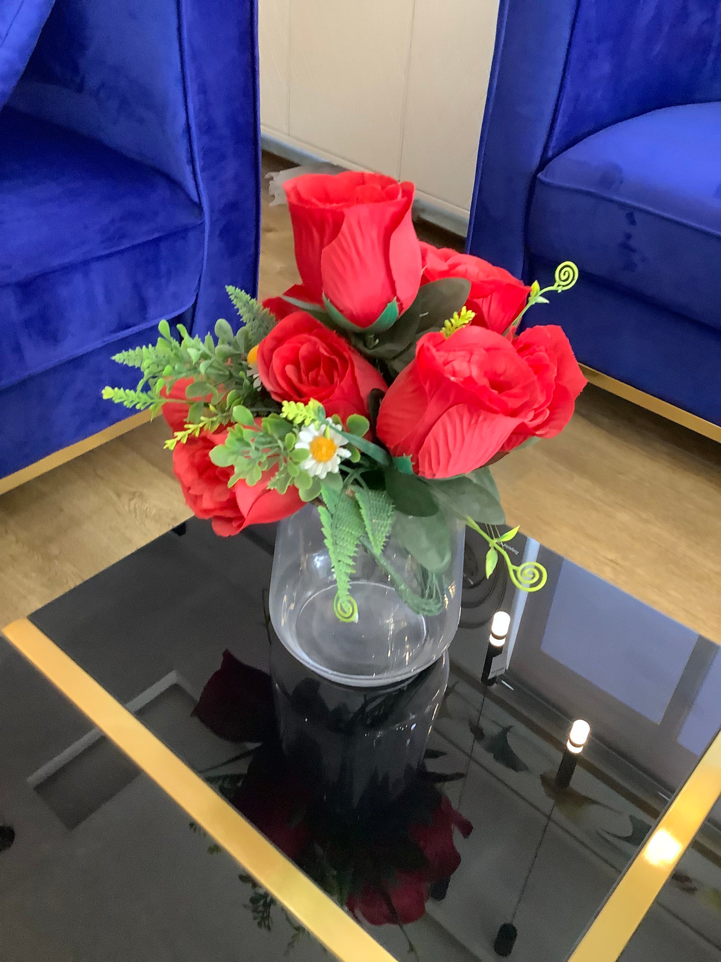 Vase and red rose