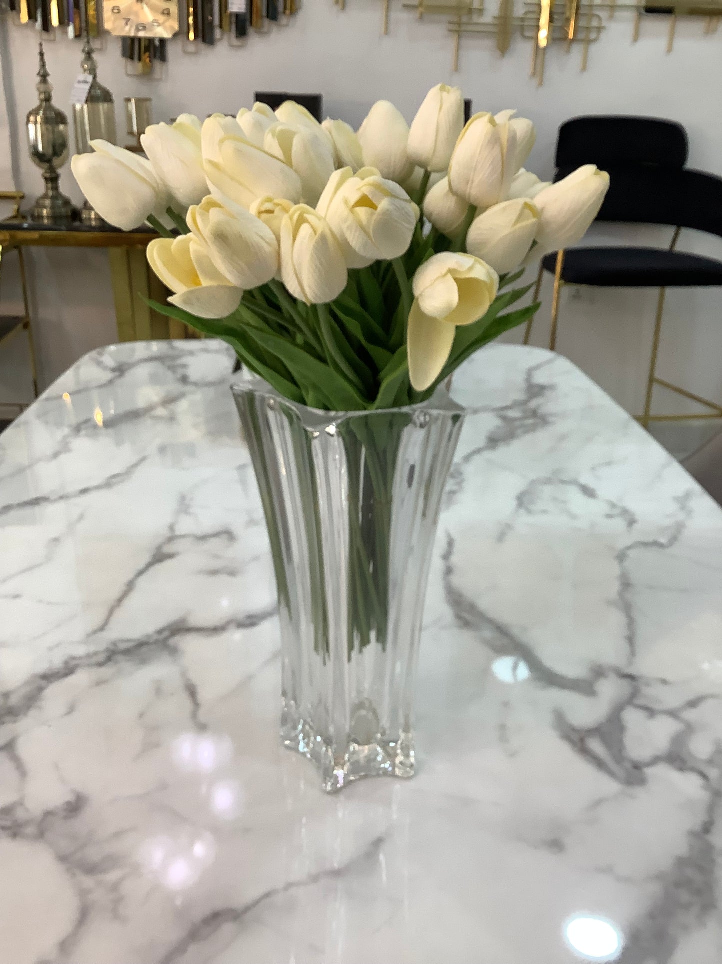 White tulip and clear vase