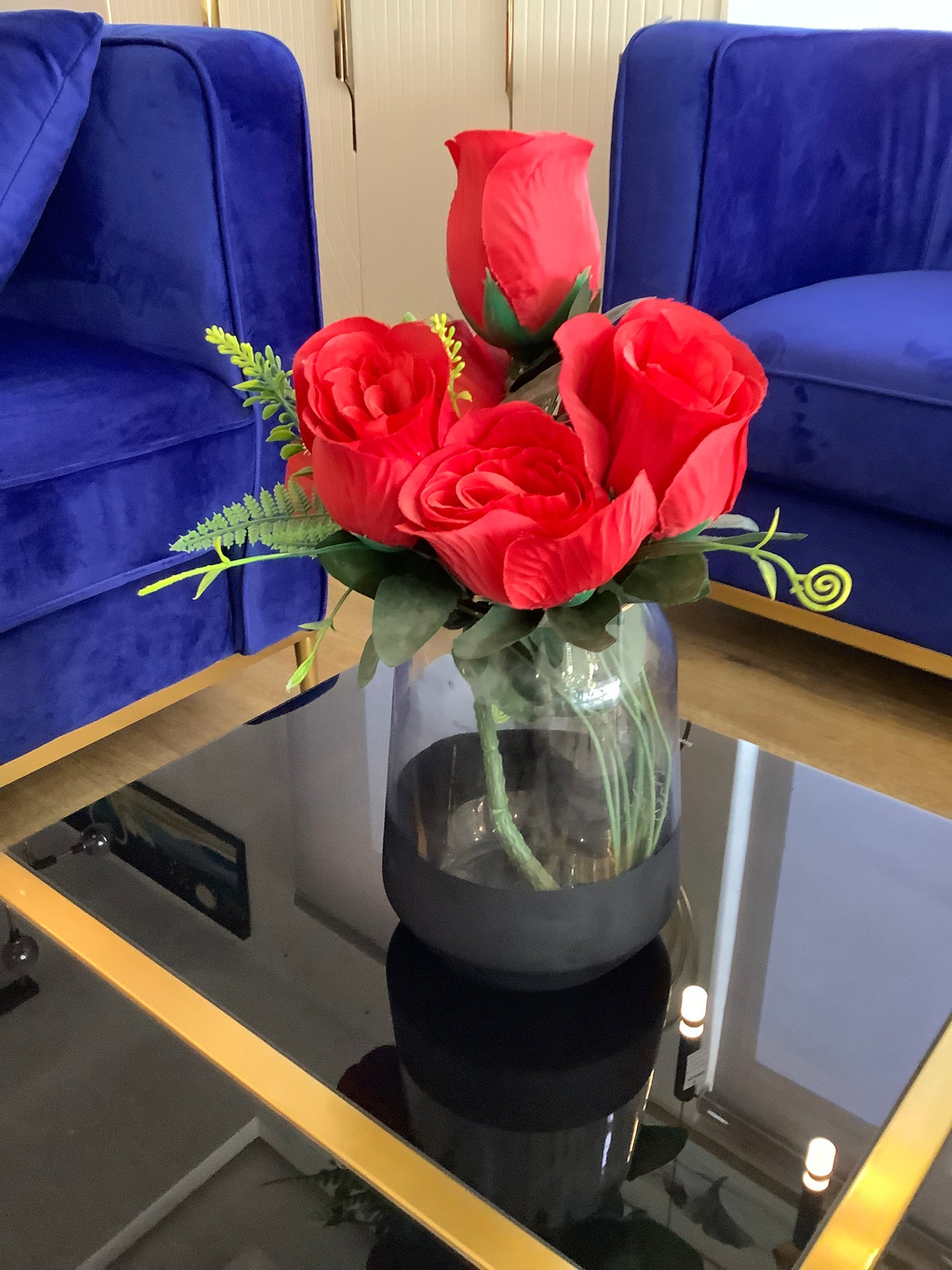 Vase and red rose