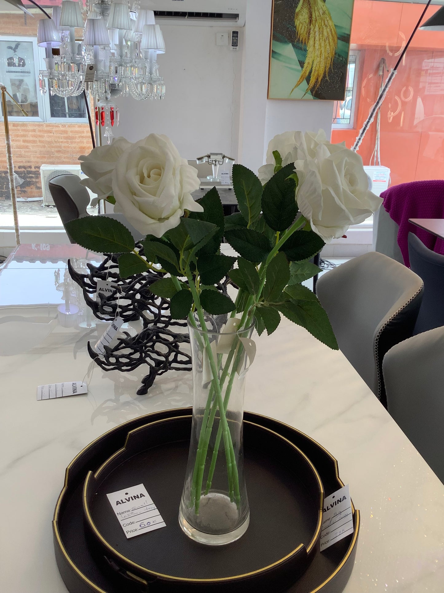 Clear vase and roses
