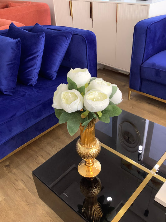 Gold vase and rose