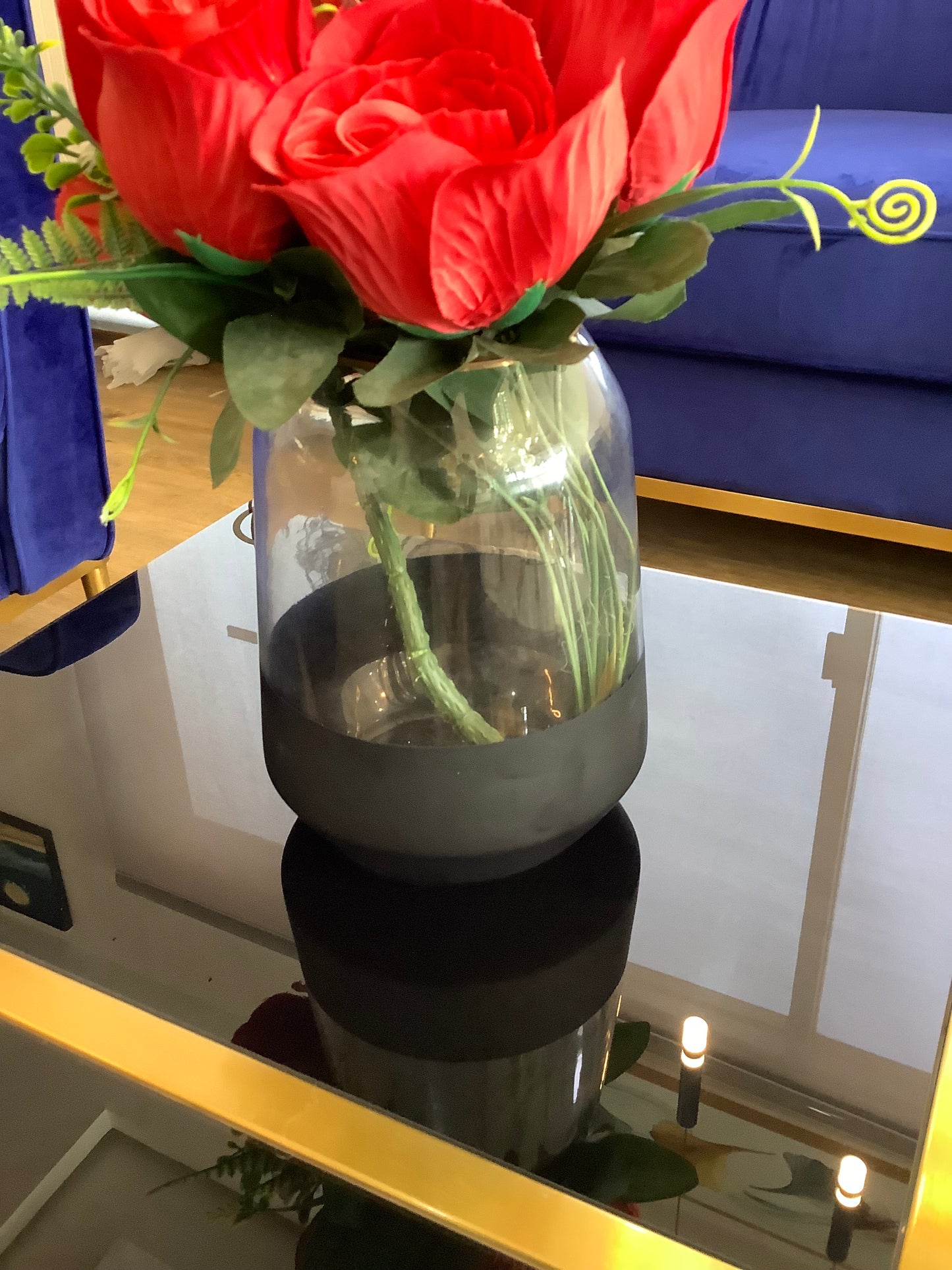 Vase and red rose