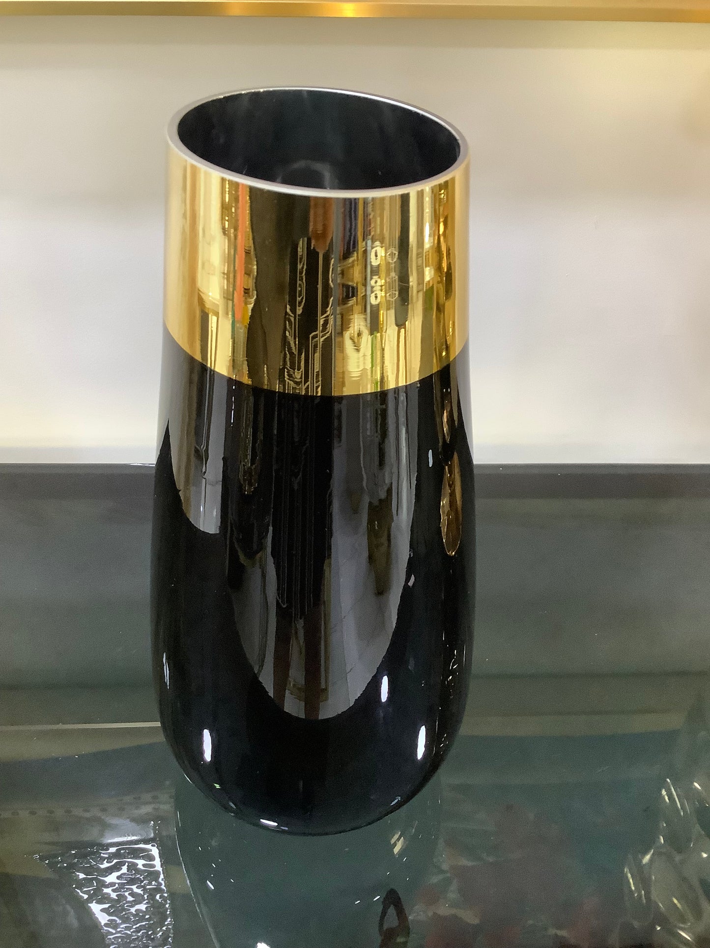 Black and gold vase