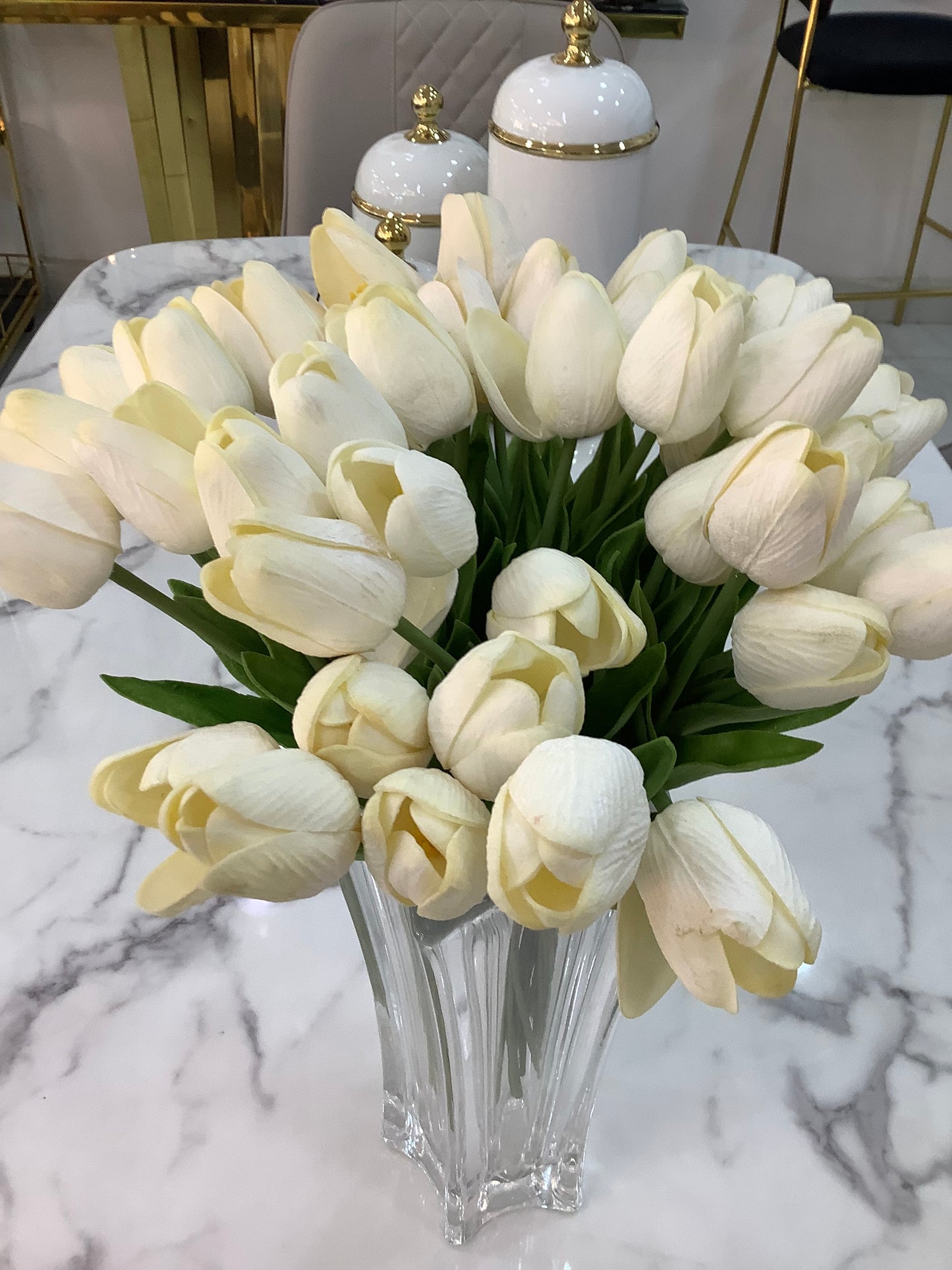 White tulip and clear vase