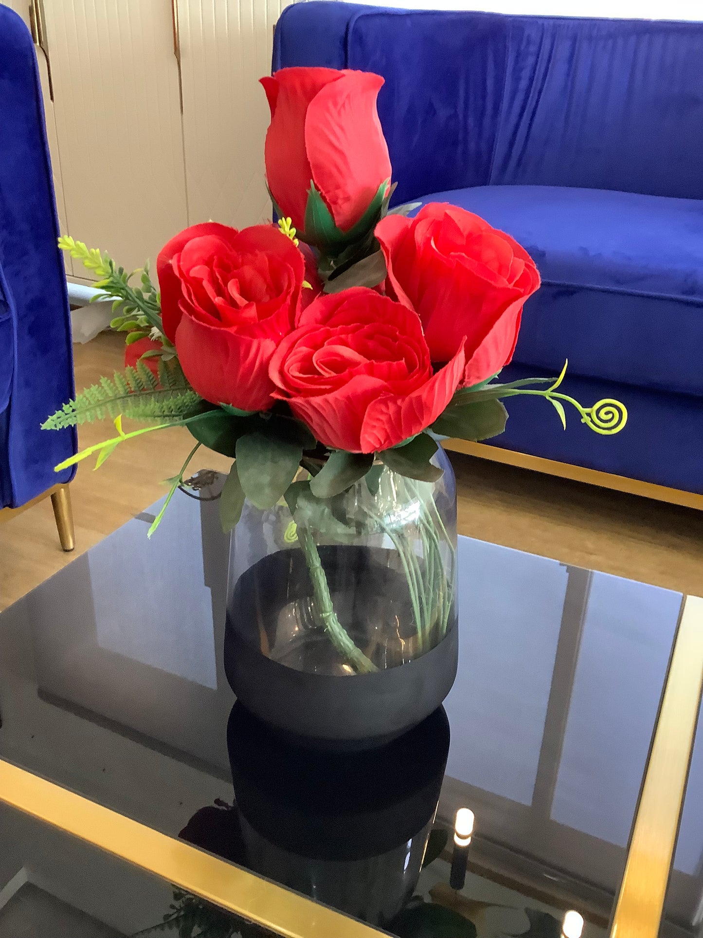 Vase and red rose