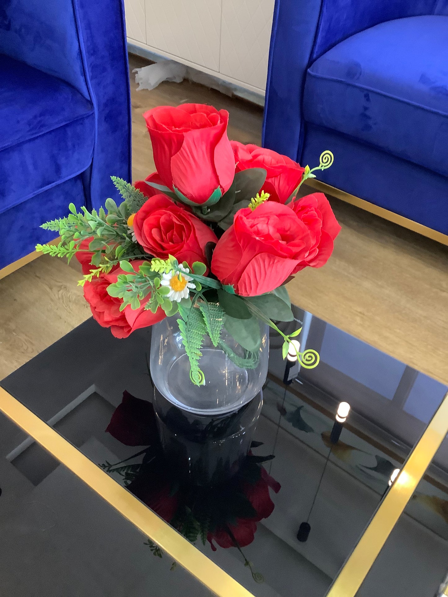 Vase and red rose