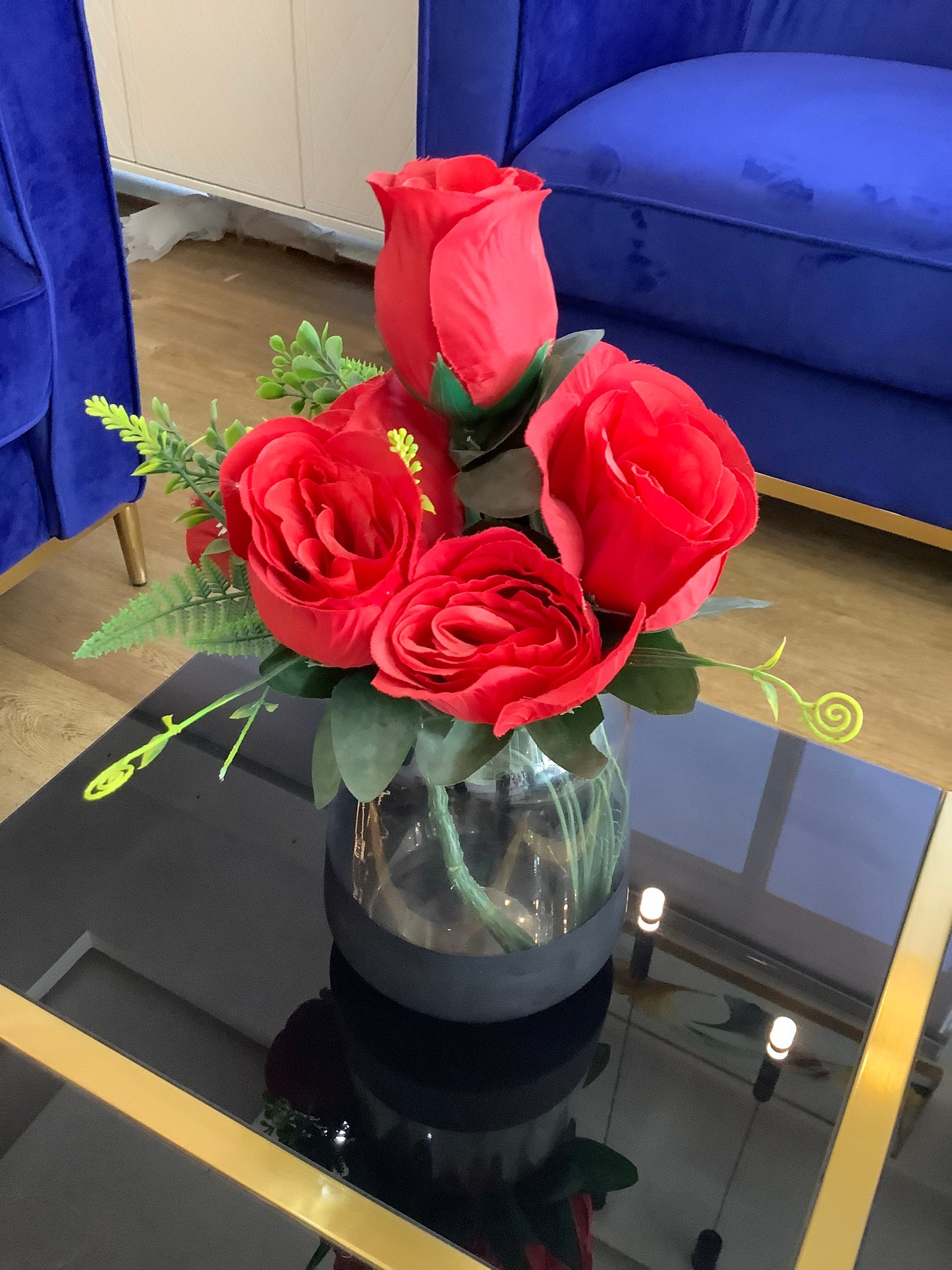 Vase and red rose